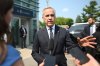 Prime Minister Mark Carney speaks to reporters as he departs the Métis Major Projects Summit in Ottawa on Thursday, Aug. 7, 2025. New Abacus Data polling shows Carney has maintained a positive approval rating despite some modest cooling. THE CANADIAN PRESS/Spencer Colby