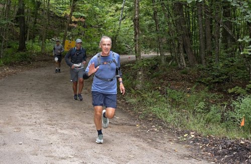 Prime Minister Mark Carney takes part in the 26-kilometre event in the Haliburton Forest Trail Race in southern Ontario as shown on Saturday Sept. 6, 2025 in this handout photo.  THE CANADIAN PRESS/Handout - Haliburton Forest-David Sweeney (Mandatory Credit)