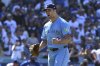Toronto Blue Jays pitcher Mason Fluharty celebrates after the last out against the Dodgers with the bases loaded during the ninth inning of a baseball game on Sunday, Aug. 10, 2025, in Los Angeles. (AP Photo/Wally Skalij)