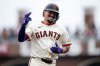 San Francisco Giants' Willy Adames rounds the bases after hitting a solo home run during the first inning of a baseball game against the Colorado Rockies, Sunday, Sept. 28, 2025, in San Francisco. (AP Photo/Thien-An Truong)