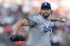 Los Angeles Dodgers' Clayton Kershaw pitches to a San Francisco Giants batter during the first inning of a baseball game Saturday, Sept. 13, 2025, in San Francisco. (AP Photo/Godofredo A. Vásquez)