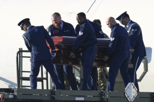 The casket containing the body of Charlie Kirk, the CEO and co-founder of Turning Point USA who was shot and killed on Wednesday is removed from Air Force Two at Phoenix Sky Harbor International Airport, Thursday, Sept. 11, 2025, in Phoenix. (AP Photo/Ross D. Franklin)