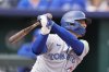 Toronto Blue Jays' Andres Gimenez watches his RBI single during the second inning of a baseball game against the Kansas City Royals, Sunday, Sept. 21, 2025, in Kansas City, Mo. (AP Photo/Charlie Riedel)