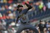 Pittsburgh Pirates pitcher Bubba Chandler throws during the third inning of a baseball game against the Washington Nationals, Saturday, Sept. 13, 2025, in Washington. (AP Photo/Terrance Williams)