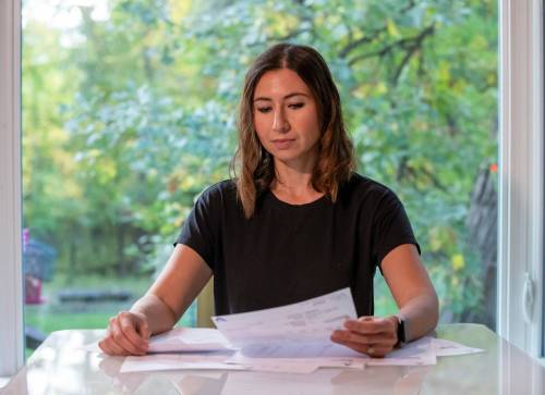 BROOK JONES / FREE PRESS
                                Michelle Olivson is concerned about a potential development of 23 houses to be built on Daman Farm Road, which is within city limits but does not have city water service.