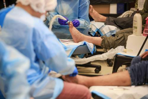 RUTH BONNEVILLE / FREE PRESS
                                A nurse checks, cleans and treats blisters, calluses and toenail issues at Salvation Army Weetamah Centre Friday &mdash; small irritants that can quickly become big problems if they get infected.