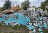 Ruth Bonneville / Free Press
                                Crews work on demolishing Happyland outdoor pool on Marion Street, Thursday. In an attempt to convince city council to keep the pool open for another season, area residents raised $86,000 last year to go toward the pool&rsquo;s operating costs. Instead, council cast a final vote to close the facility.