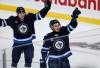 JOHN WOODS / WINNIPEG FREE PRESS
                                Winnipeg Jets&rsquo; Danny Zhilkin (53) and Kevin He (46) celebrate Zhilkinճ goal against the Minnesota Wild during first period pre-season NHL action in Winnipeg on Sunday, September 21, 2025.
