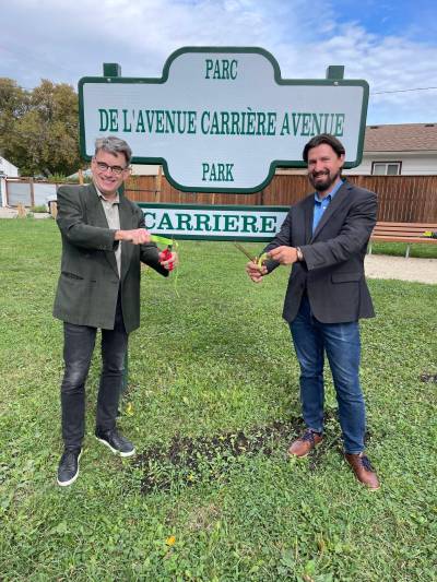 INSTAGRAM St. Vital Coun. Brian Mayes (left) and St. Boniface Coun. Matt Allard at the official opening of Carriere Avenue Park in September 2024. The councillors have withdrawn a motion to rename the park after astrophysicist and astronomer James Peebles.