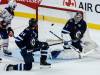 JOHN WOODS / FREE PRESS
                                Winnipeg Jets&rsquo; Dylan Samberg (54) and Edmonton Oilers&rsquo; Adam Henrique (19) look on as a shot gets past goaltender Eric Comrie during second period pre-season NHL action in Winnipeg on Tuesday.