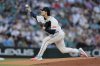 Seattle Mariners starting pitcher Bryan Woo throws against the Los Angeles Angels during the first inning of a baseball game Saturday, Sept. 13, 2025, in Seattle. (AP Photo/John Froschauer)