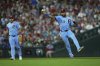 Philadelphia Phillies second base Edmundo Sosa throws New York Mets' Pete Alonso out at first during the sixth inning of a baseball game, Thursday, Sept. 11, 2025, in Philadelphia. (AP Photo/Matt Rourke)