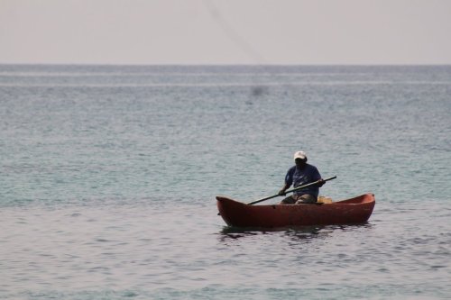 A man paddles a canoe in Annobón Island, Equatorial Guinea, Sunday, June 12, 2022. (AP Photo)