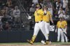 Athletics' Carlos Cortes, left, celebrates after hitting a solo home run during the third inning of a baseball game against the Cincinnati Reds, Friday, Sept. 12, 2025, in West Sacramento, Calif. (AP Photo/Sara Nevis)