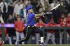 Seattle Mariners' Harry Ford hits a walkoff sacrifice fly against the Los Angeles Angels during the 12th inning of a baseball game Thursday, Sept. 11, 2025, in Seattle. (AP Photo/John Froschauer)
