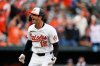 Baltimore Orioles' Dylan Beavers (12) reacts after hitting a walk-off home run in the ninth inning of a baseball game against the Tampa Bay Rays, Thursday, Sept. 25, 2025, in Baltimore. (AP Photo/Stephanie Scarbrough)