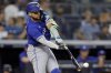 Toronto Blue Jays' Bo Bichette hits a run-scoring double during the first inning of a baseball game against the New York Yankees, Friday, Sept. 5, 2025, in New York. (AP Photo/Adam Hunger)