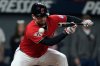 Cleveland Guardians' David Fry is hit in the face with his own bunt in the sixth inning of a baseball game against the Detroit Tigers in Cleveland, Tuesday, Sept. 23, 2025. (AP Photo/Sue Ogrocki)