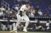 Miami Marlins' Eric Wagaman runs after hitting a single during the sixth inning of a baseball game against the Washington Nationals, Thursday, Sept. 11, 2025, in Miami. (AP Photo/Lynne Sladky)