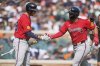 Atlanta Braves' Nacho Alvarez Jr., right, celebrates his solo home run with Matt Olson during the eighth inning of a baseball game against the Detroit Tigers, Saturday, Sept. 20, 2025, in Detroit. (AP Photo/Ryan Sun)