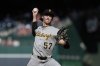 Pittsburgh Pirates pitcher Bubba Chandler throws during the first inning of a baseball game against the Washington Nationals, Saturday, Sept. 13, 2025, in Washington. (AP Photo/Terrance Williams)