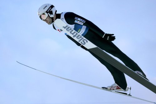 Canada's Mackenzie Boyd-Clowes soars through the air during the Men's Ski Jumping Individual HS 138 event at the Nordic World Championships in Planica, Slovenia, Friday, March 3, 2023. (AP Photo/Darko Bandic)
