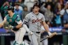 Detroit Tigers' Kerry Carpenter reacts after striking out on a foul tip to end the top of the fifth inning in Game 2 of baseball's American League Division Series against the Seattle Mariners, Sunday, Oct. 5, 2025, in Seattle. (AP Photo/John Froschauer)