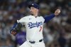 Los Angeles Dodgers starting pitcher Blake Snell throws to the plate during the first inning of a baseball game against the Colorado Rockies, Wednesday, Sept. 10, 2025, in Los Angeles. (AP Photo/Mark J. Terrill)