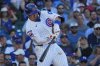 Chicago Cubs' Seiya Suzuki- hits a home run during the fifth inning of Game 1 of a National League wild card baseball game against the San Diego Padres Tuesday, Sept. 30, 2025, in Chicago. (AP Photo/Nam Huh)