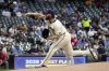 Milwaukee Brewers' Brandon Woodruff throws during the first inning of a baseball game against the Los Angeles Angels Wednesday, Sept. 17, 2025, in Milwaukee. (AP Photo/Morry Gash)