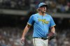 FILE - Milwaukee Brewers' Trevor Megill jogs to first base during a baseball game against the New York Mets, Saturday, Aug. 9, 2025, in Milwaukee. (AP Photo/Aaron Gash, File)