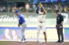 Milwaukee Brewers' Jackson Chourio (11) reacts to hitting a double as Chicago Cubs second baseman Nico Hoerner (2) looks on during the first inning in Game 1 of baseball's National League Division Series game Saturday, Oct. 4, 2025, in Milwaukee. (AP Photo/Kayla Wolf)
