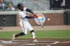 Atlanta Braves' Ozzie Albies hits a solo home run in the first inning of a baseball game against the Chicago Cubs, Monday, Sept. 8, 2025, in Atlanta. (AP Photo/Colin Hubbard)