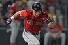 Boston Red Sox's Nate Eaton runs to first base after his single off Tampa Bay Rays pitcher Drew Rasmussen during the second inning of a baseball game Friday, Sept. 19, 2025, in Tampa, Fla. (AP Photo/Chris O'Meara)