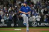 Los Angeles Dodgers starting pitcher Clayton Kershaw pretends to throw on the mound after the team's win in a baseball game against the Seattle Mariners, Friday, Sept. 26, 2025, in Seattle. (AP Photo/Ryan Sun)