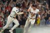 Boston Red Sox Nate Eaton, right, celebrates after scoring the winning run in the tenth inning of a baseball game against the Athletics Wednesday, Sept. 17, 2025, in Boston. (AP Photo/Robert F. Bukaty)