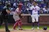 New York Mets designated hitter Mark Vientos reacts after striking out during the sixth inning of a baseball game against the Washington Nationals, Sunday, Sept. 21, 2025, in New York. (AP Photo/Yuki Iwamura)