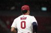 St. Louis Cardinals shortstop Masyn Winn jogs out to play the sixth inning of a baseball game against the Athletics as drizzle falls Wednesday, Sept. 3, 2025, in St. Louis. (AP Photo/Jeff Roberson)