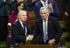 Finance Minister Francois-Philippe Champagne shakes hands with Prime Minister Mark Carney after delivering his budget speech in the House of Commons, in Ottawa, Tuesday, Nov. 4, 2025. THE CANADIAN PRESS/Sean Kilpatrick