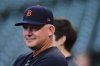 Detroit Tigers manager A.J. Hinch watches batting practice, Friday, Oct. 3, 2025, in Seattle, the day before Game 1 of baseball's American League Division Series against the Seattle Mariners. (AP Photo/Lindsey Wasson)