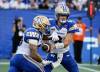John Woods / THE CANADIAN PRESS files
                                Winnipeg Blue Bombers quarterback Zach Collaros (right) and running back Brady Oliveira will watch the club&rsquo;s season finale against the Montreal Alouettes from the sideline.