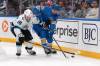 St. Louis Blues&rsquo; Pavel Buchnevich (89) and Utah Mammoth&rsquo;s Nate Schmidt (88) chase after a loose puck along the boards during the second period of an NHL hockey game Thursday, Oct. 23, 2025, in St. Louis. (AP Photo/Jeff Roberson)