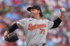 FILE - Baltimore Orioles pitcher Dietrich Enns throws during a baseball game Aug. 5, 2025, in Philadelphia. (AP Photo/Matt Rourke, File)