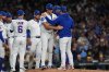 Chicago Cubs manager Craig Counsell acknowledges starting pitcher Matthew Boyd (16) while making a pitching change during the fifth inning of Game 4 of baseball's National League Division Series against the Milwaukee Brewers Thursday, Oct. 9, 2025, in Chicago. (AP Photo/Nam Y. Huh)