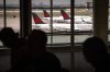 People walk near the Air Canada check-in area inside Terminal 1 of Toronto Pearson International Airport, in Mississauga, Ont., on Wednesday, Aug. 13, 2025. THE CANADIAN PRESS/Arlyn McAdorey