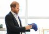 Prince Harry received a Toronto Blue Jays hat as he meets with some of Canada's oldest veterans, joining them in a creative arts program at Sunnybrook Hospital's veterans centre in Toronto, Thursday, Nov. 6, 2025. THE CANADIAN PRESS/Nathan Denette