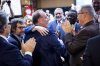 MP Chris d'Entremont, who crossed the floor from the Conservatives to join the Liberals, is applauded and embraced by his new colleagues as he arrives at a meeting of the Liberal Caucus on Parliament Hill in Ottawa, on Wednesday, Nov. 5, 2025. THE CANADIAN PRESS/Justin Tang