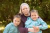 Kristina Kennedy poses for a portrait with her daughters in Toronto, in an Aug. 12, 2025, handout photo. THE CANADIAN PRESS/Handout - Black Ram Media - Maria Gagliardi Aragon (Mandatory Credit)