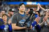 Los Angeles Dodgers pitcher Shohei Ohtani celebrates their win against the Milwaukee Brewers in baseball's National League Championship Series, Friday, Oct. 17, 2025, in Los Angeles.(AP Photo/Brynn Anderson)