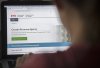A person looks at a Canada Revenue Agency homepage in Montreal on Sunday, August 16, 2020. THE CANADIAN PRESS/Graham Hughes